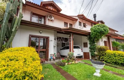 Casa em condomínio fechado com 3 quartos à venda na avenida eduardo prado, 695, cavalhada, porto alegre por r$ 730.000