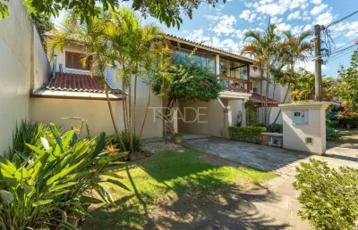Casa em condomínio fechado com 3 quartos à venda na avenida eduardo prado, 2050, cavalhada, porto alegre por r$ 1.080.000