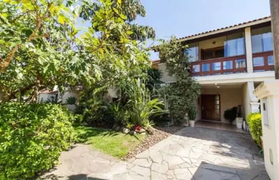 Casa em condomínio fechado com 3 quartos à venda na avenida eduardo prado, 2050, cavalhada, porto alegre por r$ 960.000