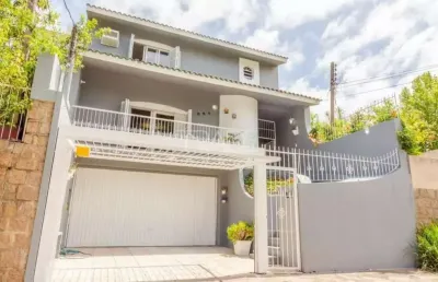 Casa com 3 quartos à venda na rua doutor barcelos, 654, tristeza, porto alegre por r$ 1.280.000