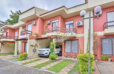Casa em condomínio fechado com 3 quartos à venda na rua doutor armando barbedo, 1161, tristeza, porto alegre por r$ 1.020.000