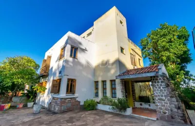 Casa com 5 quartos à venda na rua goitacaz, 349, vila assunção, porto alegre por r$ 1.300.000