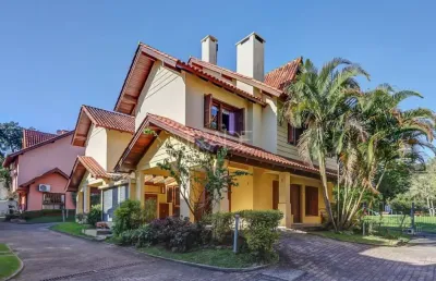 Casa em condomínio fechado com 3 quartos à venda na rua luís felipe monmany, 101, guarujá, porto alegre por r$ 650.000