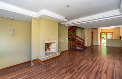 Casa com 3 quartos à venda na rua almirante mariath, 168, tristeza, porto alegre por r$ 990.000