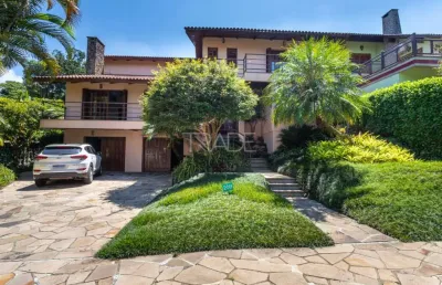 Casa em condomínio fechado com 5 quartos à venda na avenida firmino octávio bimbi, 255, cavalhada, porto alegre por r$ 2.488.000