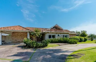 Casa em condomínio fechado com 3 quartos à venda na avenida juca batista, 8000, belém novo, porto alegre por r$ 3.490.000