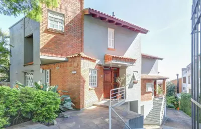 Casa em condomínio fechado com 3 quartos à venda na rua padre joão batista reus, 1700, tristeza, porto alegre por r$ 670.000