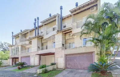 Casa em condomínio fechado com 3 quartos à venda na avenida coronel marcos, 39, pedra redonda, porto alegre por r$ 980.000
