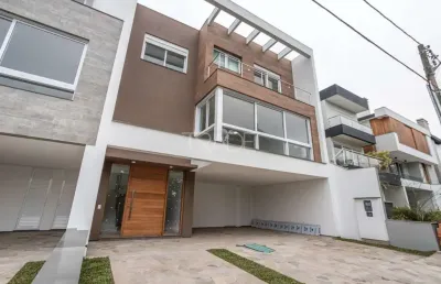 Casa em condomínio fechado com 3 quartos à venda na rua ivo walter kern, 599, hípica, porto alegre por r$ 1.595.000