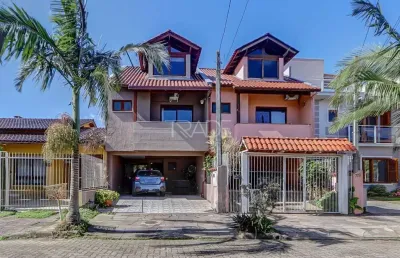 Casa em condomínio fechado com 3 quartos à venda na rua pau brasil, 728, hípica, porto alegre por r$ 495.000