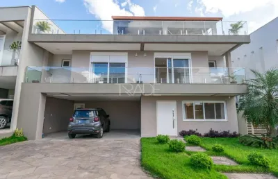 Casa em condomínio fechado com 4 quartos à venda na rua ivo walter kern, 599, hípica, porto alegre por r$ 1.860.000