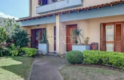 Casa em condomínio fechado com 3 quartos à venda na rua doutor mário totta, 416, tristeza, porto alegre por r$ 630.000
