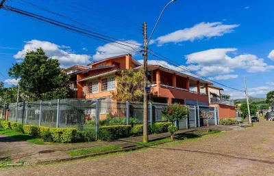 Casa com 4 quartos à venda na rua paulo derly strehl, 170, ipanema, porto alegre por r$ 1.390.000