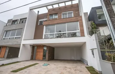 Casa em condomínio fechado com 3 quartos à venda na rua ivo walter kern, 599, hípica, porto alegre por r$ 1.670.000