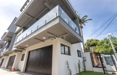 Casa em condomínio fechado com 3 quartos à venda na travessa nova trento, 364, tristeza, porto alegre por r$ 1.690.000