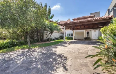 Casa em condomínio fechado com 3 quartos à venda na avenida juca batista, 8000, belém novo, porto alegre por r$ 1.685.000