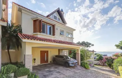 Casa em condomínio fechado com 4 quartos à venda na rua professor ildefonso gomes, 80, vila conceição, porto alegre por r$ 2.690.000