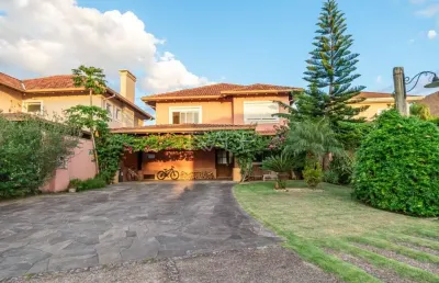 Casa em condomínio fechado com 4 quartos à venda na avenida juca batista, 8000, belém novo, porto alegre por r$ 2.660.000
