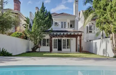 Casa em condomínio fechado com 4 quartos à venda na avenida juca batista, 8000, belém novo, porto alegre por r$ 1.500.000
