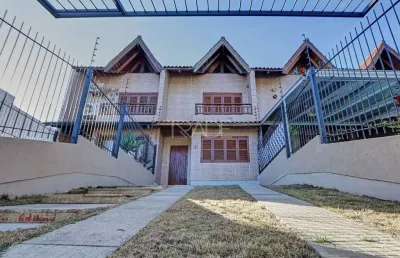 Casa com 3 quartos à venda na rua doutor sady soares, 59, guarujá, porto alegre por r$ 419.000