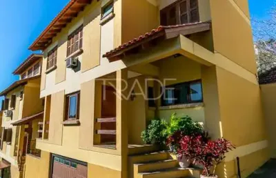 Casa em condomínio fechado com 3 quartos à venda na rua general rondon, 1256, tristeza, porto alegre por r$ 875.000