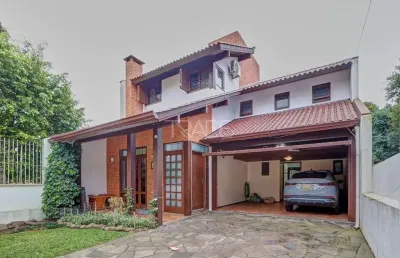 Casa com 3 quartos à venda na rua almirante delamare, 170, tristeza, porto alegre por r$ 1.200.000