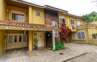 Casa em condomínio fechado com 3 quartos à venda na rua doutor armando barbedo, 832, tristeza, porto alegre por r$ 800.000