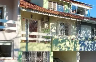 Casa em condomínio fechado com 3 quartos à venda na rua padre joão batista reus, 983, tristeza, porto alegre por r$ 929.000
