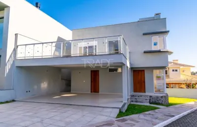 Casa em condomínio fechado com 3 quartos à venda na rua ivo walter kern, 599, hípica, porto alegre por r$ 1.080.000