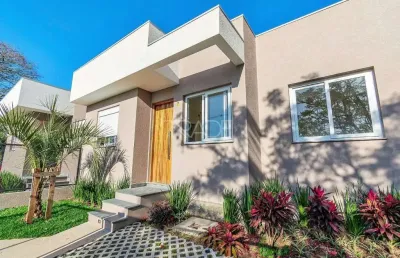 Casa com 3 quartos à venda na rua criciúma, 35, guarujá, porto alegre por r$ 390.000