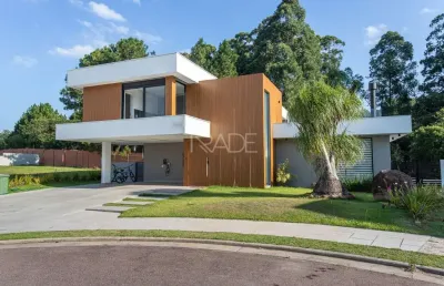 Casa em condomínio fechado com 4 quartos à venda na estrada das três meninas, 2000, vila nova, porto alegre por r$ 3.100.000