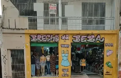 Prédio de 265,39 m², com uma loja e dois apartamentos, para venda