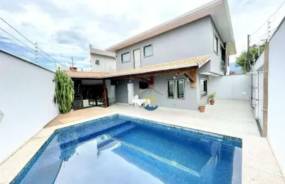 Sobrado com 3 dormitórios à venda, 160 m² por r$ 1.330.000 - caiçara - praia grande/sp