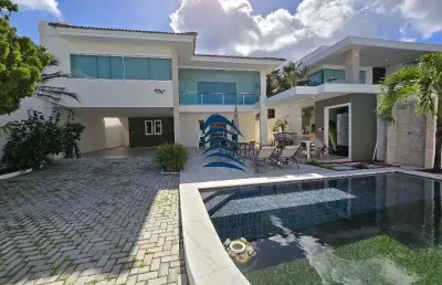 Casa luxuosa dúplex, nascente, 4 dormitórios sendo 3 suítes, 4 vagas, piscina e área gourmet com churrasqueira no condomínio de vilas do atlântico