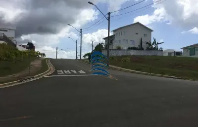 *vendo lote * ?*alphaville litoral norte 2 *  ??área com 547m2 nascente, posição privilegiada, terreno declive .