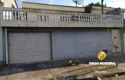 Casa à venda em terra preta com pomar de árvores frutíferas
