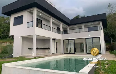 Casa exclusiva à venda em loteamento com vista deslumbrante!