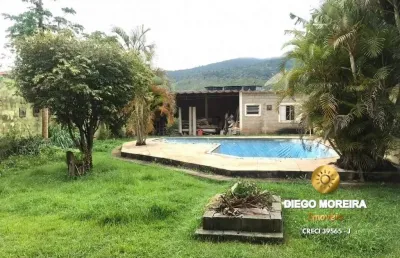 Chácara á venda em terra preta com 3 dormitórios - 500 m²