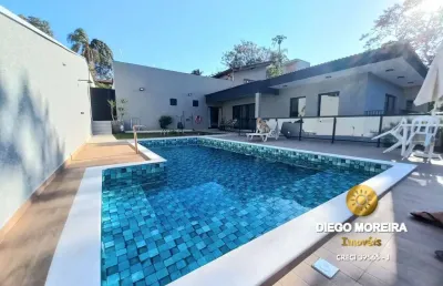 Imóvel com 2 casas à venda em terra preta no mesmo terreno