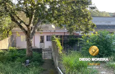 Casa térrea com terreno amplo – 300m²! - em terra preta