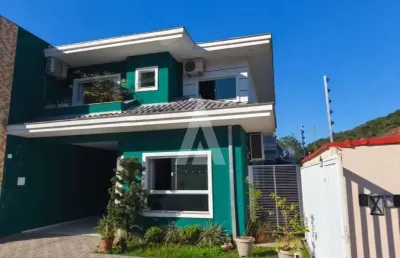 Casa em condomínio fechado com 3 quartos à venda na rua vinte e quatro de abril, --, pirabeiraba, joinville, 122 m2 por r$ 645.000