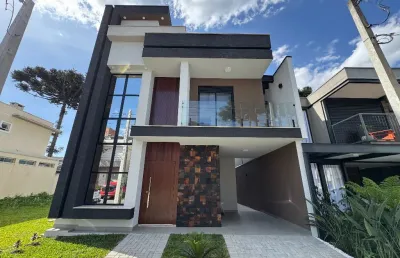 Sobrado triplex 4 quartos (uma suite) em condominio no umbará
