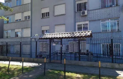 Ótimo apto térreo com 1dormitório, sala, cozinha, banheiro, área de serviços e estacionamento rotativo, dormitório com máveis sob medida , ar split, cozinha com móveis sob medida, pia com tampo em gra