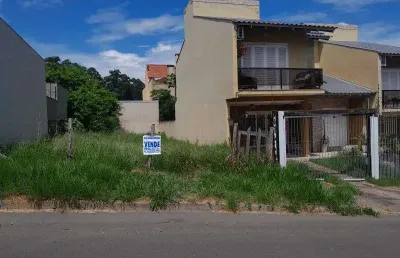 Ótimo terreno com 08 x 25 ( 200m²) limpo, entre residencias de médio padrão,  com vista para o guaiba, documentação em dia.