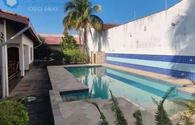 Casa pé na areia 5 quartos suíte piscina área gourmet 50m mar itanhaém sp