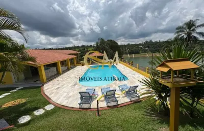 Chácara em condomínio pé na água na cidade de piracaia.