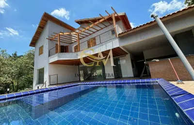 Casa de condomínio com 4 quartos e 6 banheiros à venda