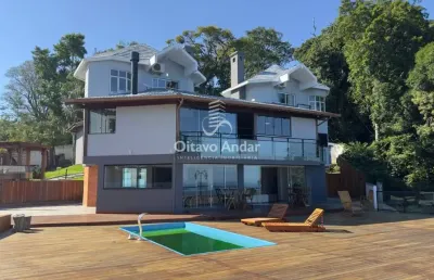 Casa com vista mar com 4 suítes - lagoa da conceição