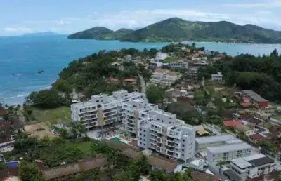 Ubatuba aruna resort apto 85m² praia da enseada pé na areia alto padrão