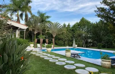 Casa com 6 dormitórios à venda, com arquitetura colonial americana no condomínio city castelo, à poucos minutos do cacau park